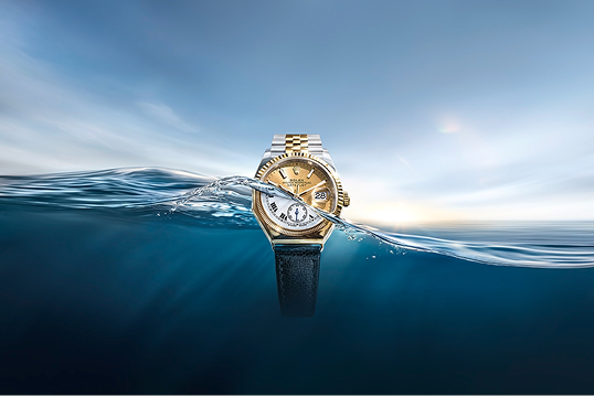 A centenary Oyster watch emerging from the ocean